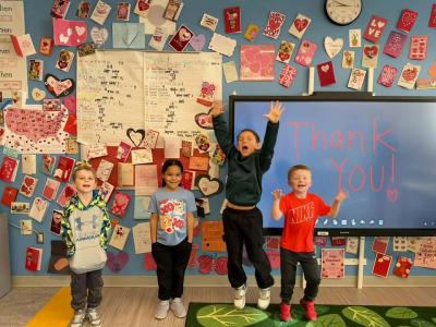 Students celebrating reaching their goal.