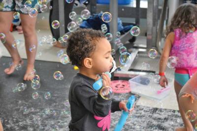 Amina Wheeler tries to blow a bubble.