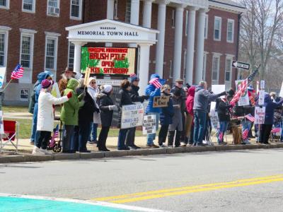Protestors gathered outside of Town Hall. 