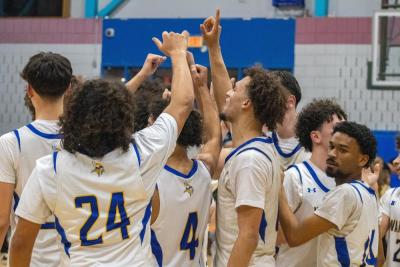 The Vikings celebrate their victory. Photos by Grace Roche