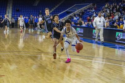 Malikhi Tavares goes for a last second shot.
