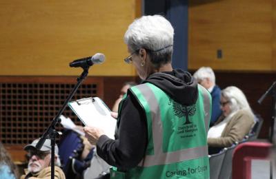 Jo-Anne Finn donned her green vest for Town Meeting.