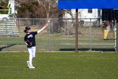 Brayden Pease pitches the ball back to Coach Cabe.