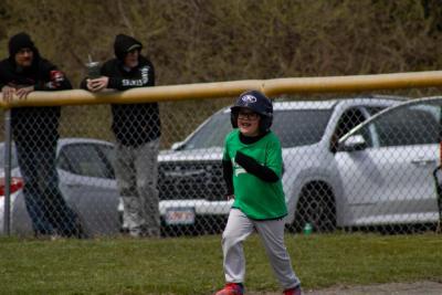 It's a hit! A teeball player books it to second. 