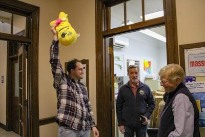 Josh Faherty holds up his prize.