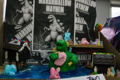 Godzilla makes a mess of Main Street.