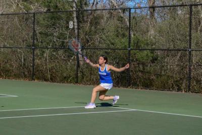 Jooly Salem runs toward the net. 