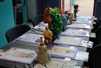 These monsters were imagine by elementary schoolers and brought to life by high school artists.
