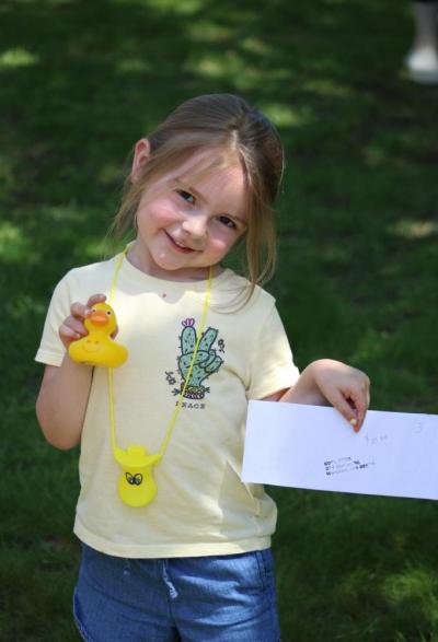 Kamryn Lyons shows off her winning duck.