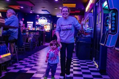 Danny Craig and his mom Brandy boogie down to the arcade. 