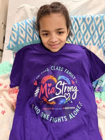 Mia with Mia Strong shirt