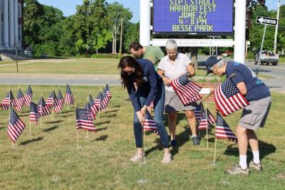 State Sen. Kelly Dooner pokes hole for flag