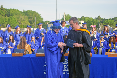 Matty Champa shakes Sean Brown's hand. 