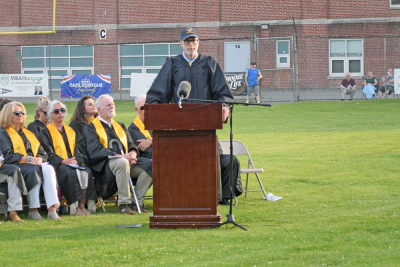 Matthew D'Andrea advises the students on how to be happy. 