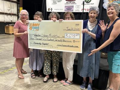 Organizers hold up a big check for the funds they raised. From left to right: Eliese Catarius, Karen Hong, Kerry Mello, Elisa Heard, Priscilla Porter, Tricia Norton. Source: Wareham Library Foundation