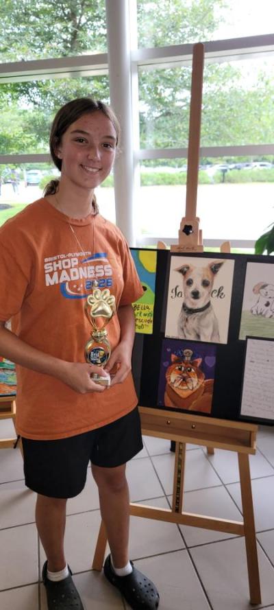 Ava Ostiguy with her winning Yorkie drawing.