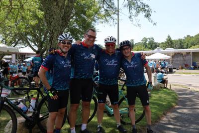 From left: Josh Hurwitz, Larry Stein, Eric Shaff and Michael Silverstein pose for a picture with 10 miles left of the Saturday ride. 