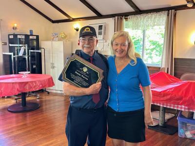 Warren was presented with a plaque celebrating his work. Submitted photos