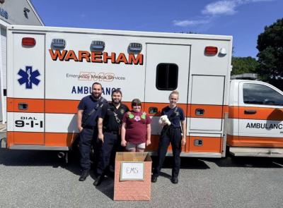 Ainslee Manduca brings stuffed animals she collected to local emergency medical technicians. Submitted photo