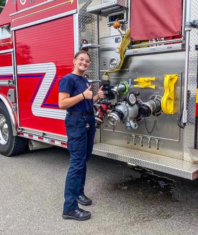Jenna Klemp, 22, from Onset, is the first female full-time firefighter at Onset Fire Department. Photos source: Jenna Klemp