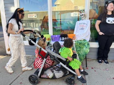 Trick or treaters stroll down Main Street. 