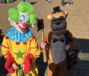 A clown and Teddy from Five Nights at Freddy's.