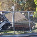 Part of the roof remained after the structure had toppled. Photo by Brandy Muz