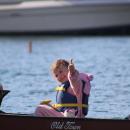 Pigs can't fly but they can paddle as Sylvia Baumann flashes a thumbs-up.
