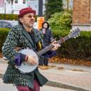 A banjo player brings folksy tunes to the parade.