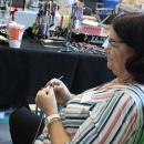 One booth works on future sale items during the fair.