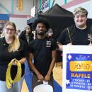 Students walk around selling raffle tickets.