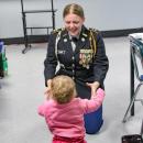 Small steps by Ava's little sister following the ceremony.