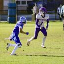 Jayden Medeiros makes a push for the endzone.
