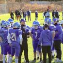 Coach Cy Bariteau pumps up his team during a time-out.