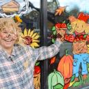 Leslie Durling outside of the cafe on Halloween. Photo by Brandy Muz