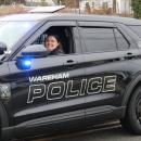 The Wareham Police Department flashes their lights for the parade.