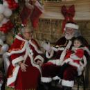Mrs. Claus and Santa start to hear what children want for Christmas.