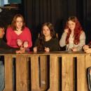 Smack dab in a final celebration, Evelyn Medina is Tiny Tim.