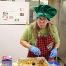 Pastor Ginny Doran getting a taste of the mac and cheese.