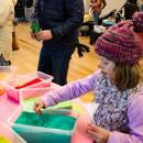 Abbie Silva making sand ornaments.