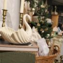 A swan bowl sits near the register.