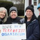 Maria and Ed in the center gathered with friends.