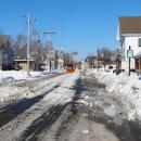 Snow removal on Main Street began in the early morning Thursday, Jan. 29. Photo by Bobby Grady