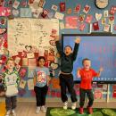 Students celebrating reaching their goal.