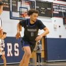 Rose bounds down the court.