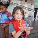Jackson, 5, holds a bubble he caught.