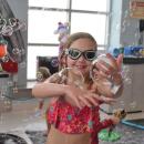 Grace, 7, shows off some bubbles she caught. Photos by Kat Sheridan