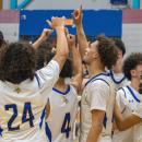 The Vikings celebrate their victory. Photos by Grace Roche