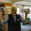 Town Clerk Lisa Johnson holding up the 'real' voting ballots for the town peep election. 