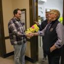 Josh Faherty and Lisa Johnson shake hands. 